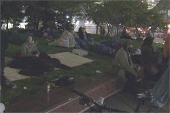 Protesters spend the night in downtown park