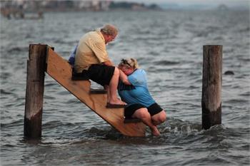 $3 billion damage bill as Irene heads east