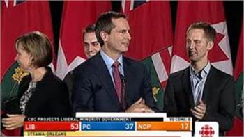 Ontario's McGuinty re-elected, but loses majority