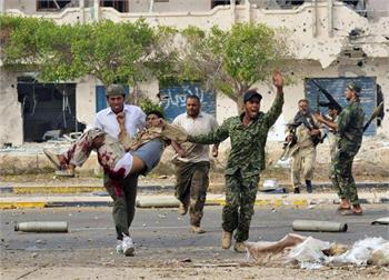 Libyan fighters drive out Gadhafi loyalists, declare victory in Sirte