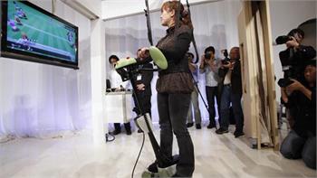 Toyota unveils health-care robots