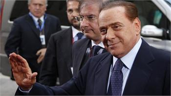 Italy's Berlusconi confirms he'll step aside