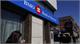 Canadian banks raise cash as debt feud drags on